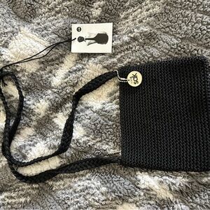 The Sak Black Woven Crossbody Pouch with Logo Charm